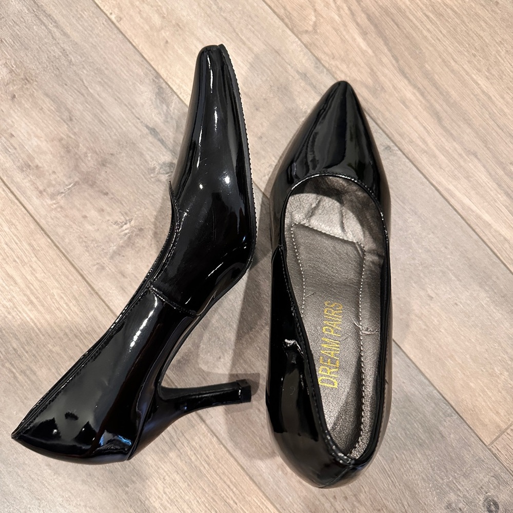 Black pointed toe heels